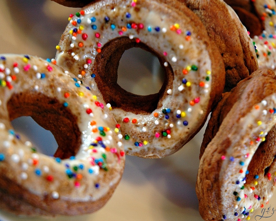 A close up shot of Low Calorie Baked Donuts with a Greek yogurt frosting.