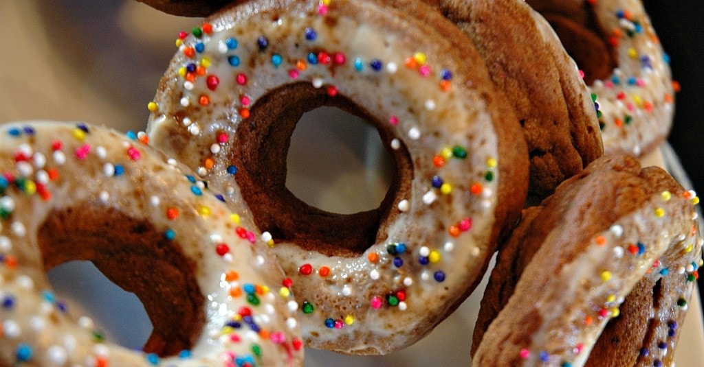 Homemade low calorie donuts with icing and sprinkles. 