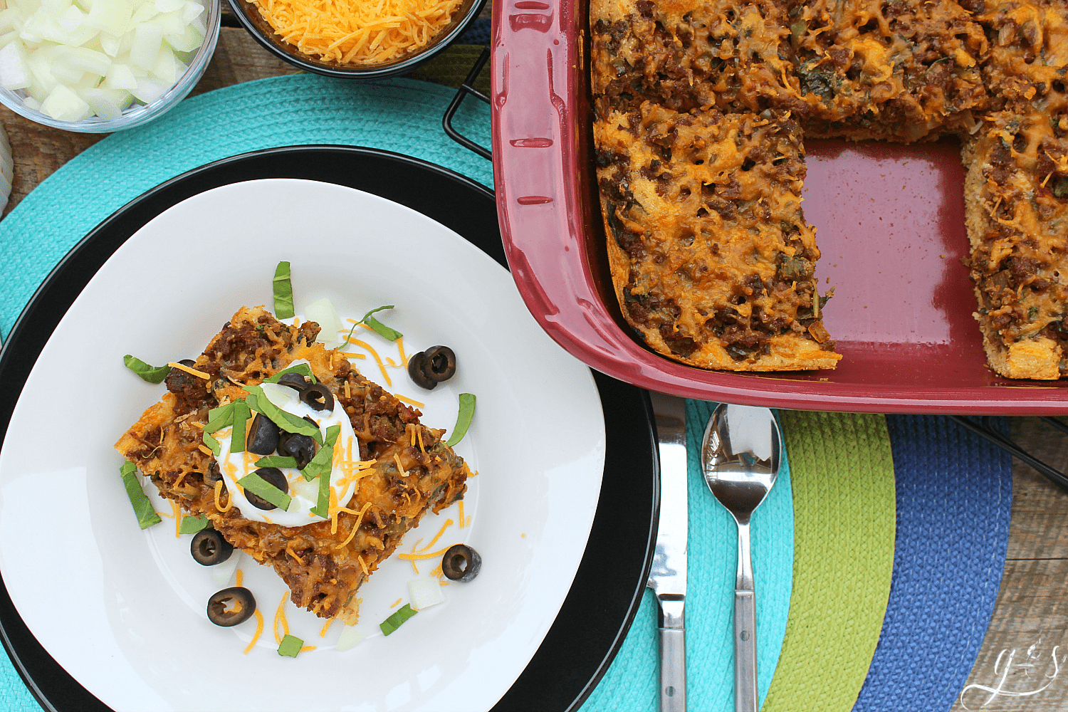 The BEST Clean Eating Mexican Cornbread Casserole | This healthy, easy, and gluten-free recipe contains no processed ingredients and TONS of veggies aka WHOLE FOODS like onion, spinach, bell pepper, and salsa! It can be made with ground beef or any other meat such as buffalo, venison, or ground turkey. If you are looking for a new from scratch homemade family meal this one's for you! 