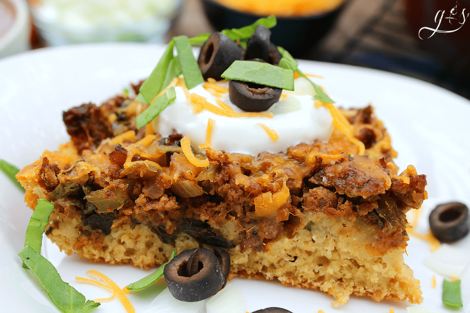 The BEST Clean Eating Mexican Cornbread Casserole | This healthy, easy, and gluten-free recipe contains no processed ingredients and TONS of veggies aka WHOLE FOODS like onion, spinach, bell pepper, and salsa! It can be made with ground beef or any other meat such as buffalo, venison, or ground turkey. If you are looking for a new from scratch homemade family meal this one's for you! 