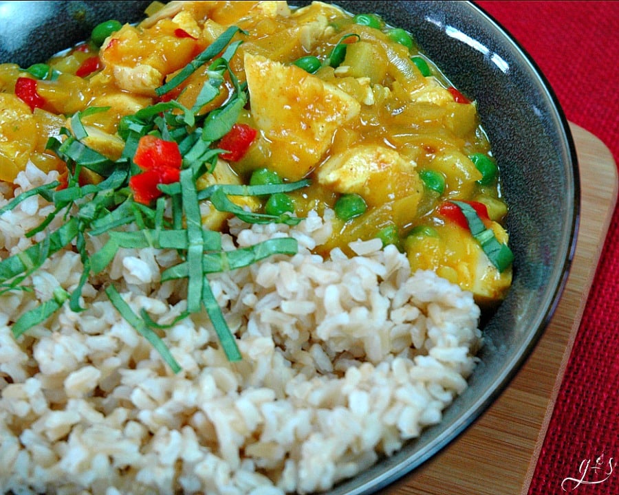 Fall recipes: A bowl of Sweet & Spicy Turkey Curry from HappiHomemade.com with a side of rice.