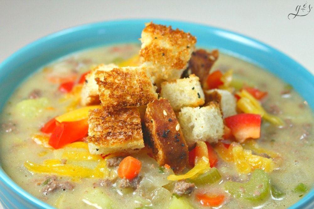 This quick and easy stovetop Whole Foods Makeover Cheeseburger Soup has all the flavors of a cheeseburger while still being healthy and gluten free! Try using lean ground venison or ground turkey like we did. You can also make this low carb by omitting the potatoes, there are 4 other veggies, you won't even notice. This skinny recipe is the best we have tasted especially garnished with pickles! 
