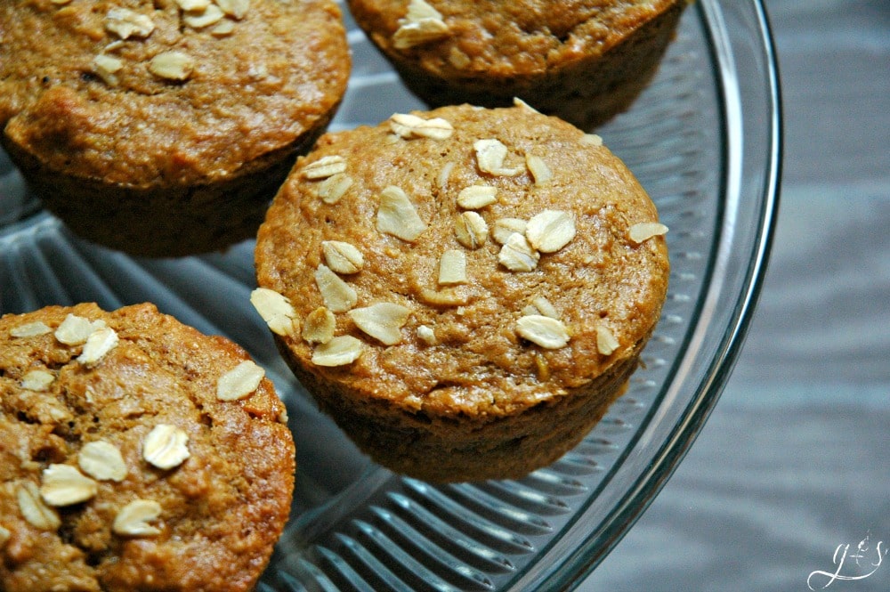 These easy Chunky Monkey Muffins have a surprise twist! Not only does this healthy breakfast recipe contain bananas, peanut butter (or PB2), and oatmeal...but a surprise chocolate center! If you want to "WOW" your friends and family with a new recipe this is it! It's a fun idea for kids after school snacks too! These also contain simple and nourishing ingredients such as coconut oil, coconut sugar, and oats! 