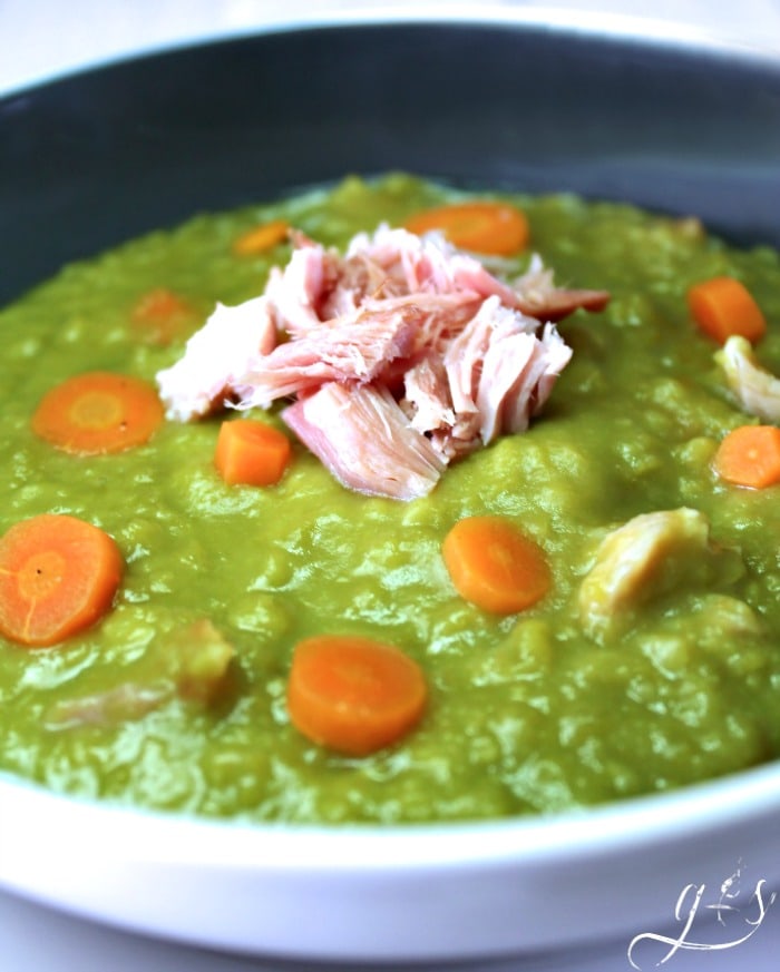 Simply the BEST Split Pea Soup- an easy and healthy stove top meal recipe that uses leftover ham or turkey bacon along with tons of clean eating vegetables and stock. 