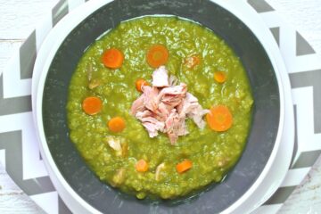 Simply the BEST Split Pea Soup- an easy and healthy stove top meal recipe that uses leftover ham or turkey bacon along with tons of clean eating vegetables and stock. Make it vegetarian or vegan by using vegetable broth and omitting the meat. This creamy, hearty, and classic homemade soup is simple to prepare and has been a family favorite of ours for years!