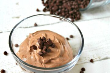 The BEST Skinny Chocolate Fruit Dip for One | A healthy, high protein dip recipe made with plain Greek yogurt and other clean eating ingredients! This easy and low carb chocolate dip will quickly become your favorite snack! It's perfect for dipping fruit like apples or strawberries.
