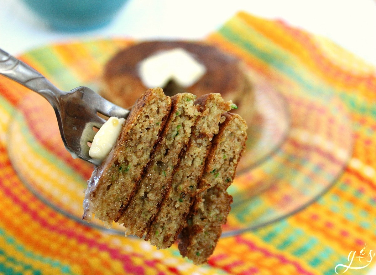  The Best Lemon Zucchini Pancakes | This delicious recipe is perfect for an easy school day breakfast for the kids. These simple from scratch flapjacks are just what you need to make your morning easy. Try freezing half the batch of these healthy, homemade, & whole wheat pancakes to eat later. The combination of healthy zucchini and fresh lemon create a sweet and easy pancake perfect for any family meal!