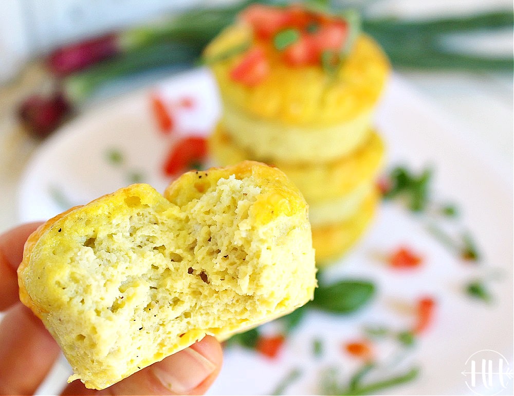 A bite has been taken out of this mini frittata muffin.