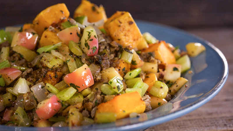 A plate full of Breadless Butternut Stuffing from Rachael Ray.