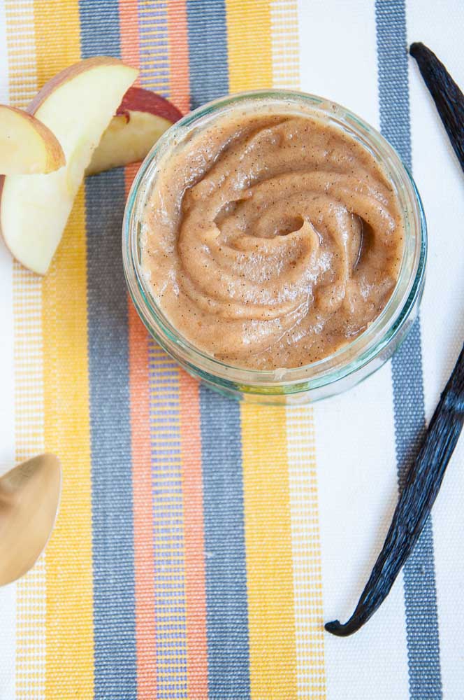 Creamy Healthy Caramel Dip from Vegan Family Recipes surrounded by apple slices and vanilla bean.