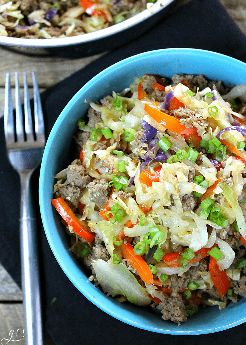 7 Ingredient Skinny Egg Roll Bowl | Chinese food in a bowl is always a winner, but easy and healthy Chinese recipes are even better. This clean eating, vegetable packed, turkey sausage (or pork) combination is sure to cure any takeout cravings you have. Whether you are following Whole 30, low carb, Weight Watchers, 21 Day Fix, Paleo, or Thm (Trim Healthy Mama), you will love the newest gluten free recipe on the block!