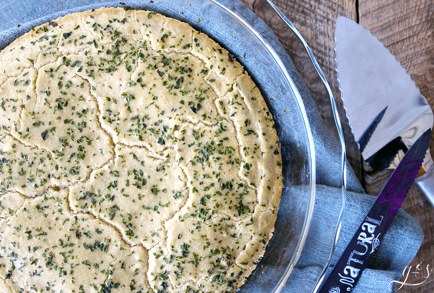 The BEST Gluten Free Focaccia Bread | This healthy and easy recipe is perfect alongside a soup or as an appetizer dipped in olive oil! The addition of rosemary and garlic make this delicious side dish a keeper. It isn't easy to find homemade and clean eating in a bread, but this one delivers! The tapioca flour, coconut flour, and eggs make this a low carb option as well as grain and dairy free.