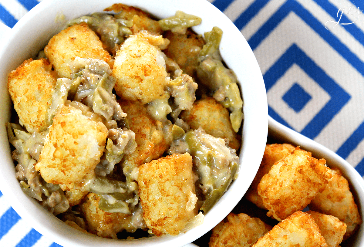 The BEST Gluten-Free Tater Tot Casserole | This easy original recipe will quickly become your family's favorite meal! Only 10 simple ingredients like ground beef, milk, green beans, and tater tots combine into a gluten-free recipe that is more healthy than the cream soup variety. Lightened up comfort foods can taste delicious! Let's feed our families dinners and dishes that offer more nutrition while still saving money and living a frugal lifestyle.
