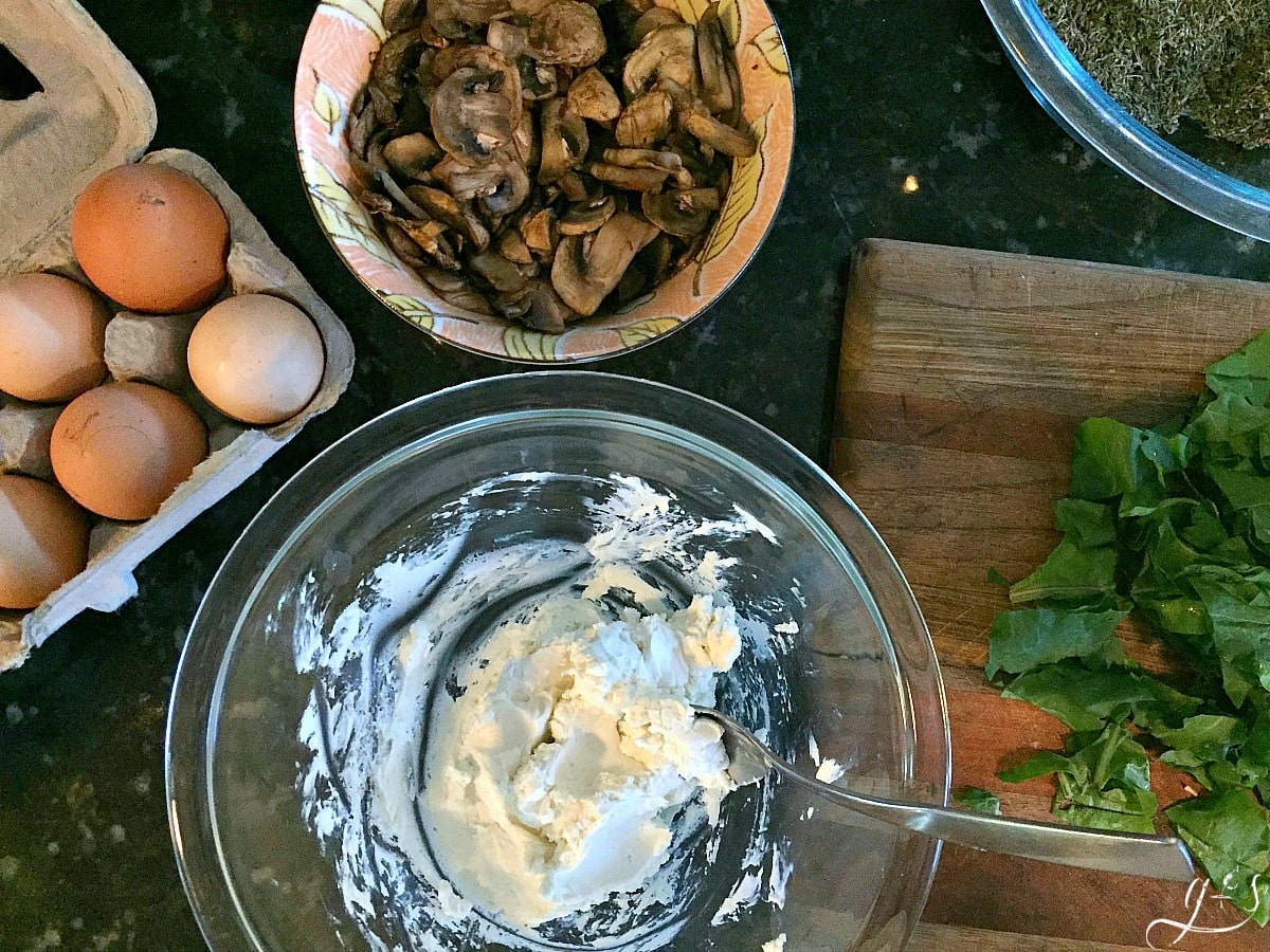 Chevre cheese, roasted mushrooms, arugula, and eggs to use in savory crepes.