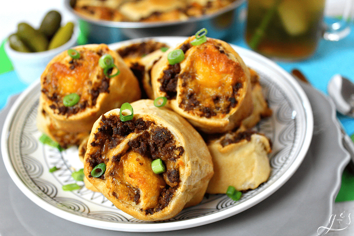 The BEST Sloppy Joe Pinwheels | This 6 ingredient recipe is easy, kid-friendly, and ahhhhmazing! All you need is ground meat (beef, turkey, buffalo, venison), a few pantry essentials, and crescent roll dough. This homemade dinner or fun lunch idea is as simple as they come and perfect for families. These roll ups would also make a wonderful football (think Super Bowl) party appetizer. Similar to Garbage Bread or Cheeseburger Pockets but easier and, dare I say, more delicious!