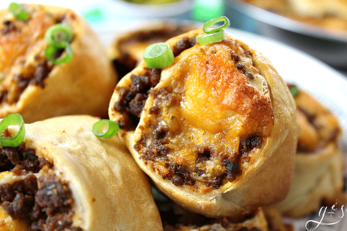 The BEST Sloppy Joe Pinwheels | This 6 ingredient recipe is easy, kid-friendly, and ahhhhmazing! All you need is ground meat (beef, turkey, buffalo, venison), a few pantry essentials, and crescent roll dough. This homemade dinner or fun lunch idea is as simple as they come and perfect for families. These roll ups would also make a wonderful football (think Super Bowl) party appetizer. Similar to Garbage Bread or Cheeseburger Pockets but easier and, dare I say, more delicious!