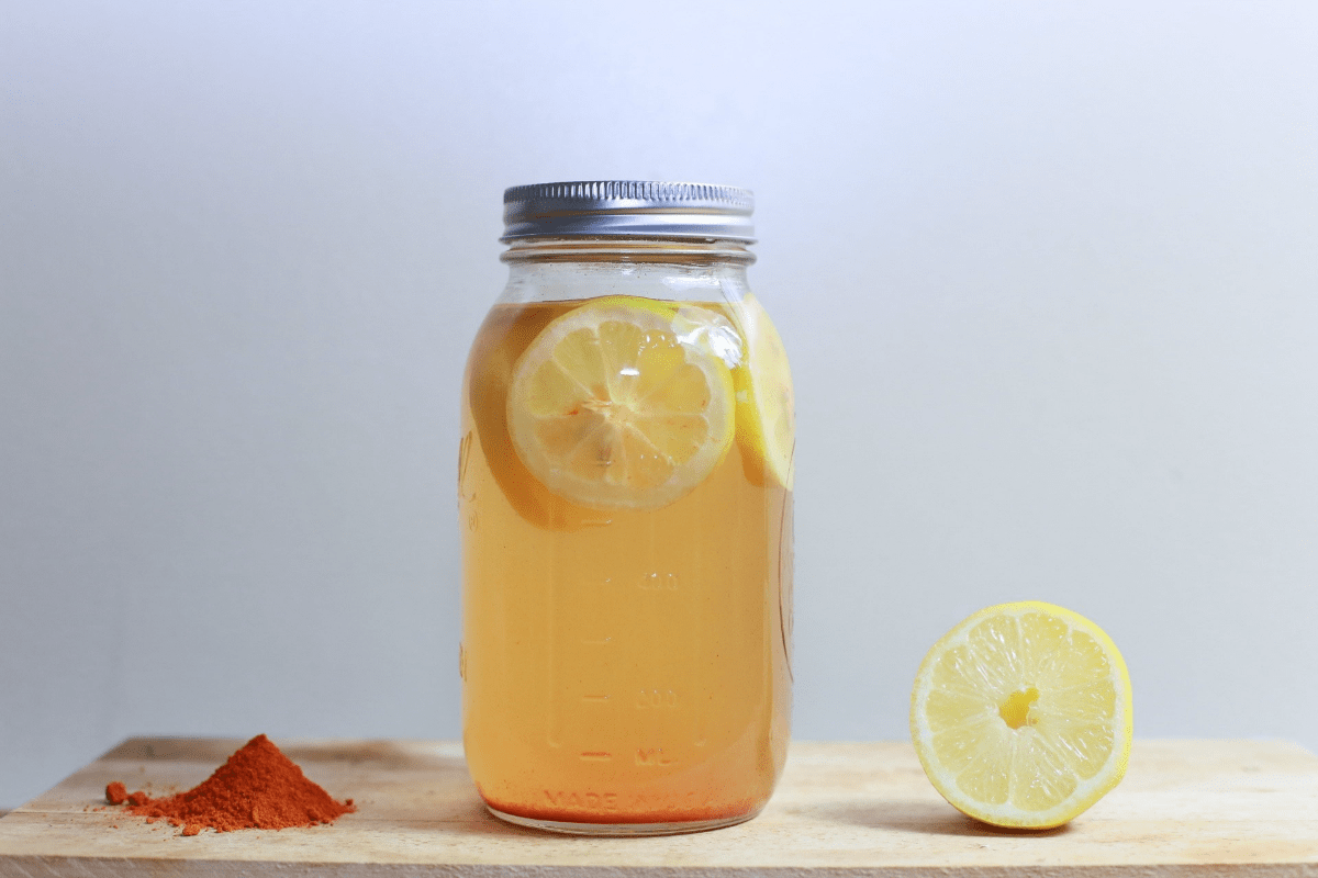 Lemon water in a mason jar.