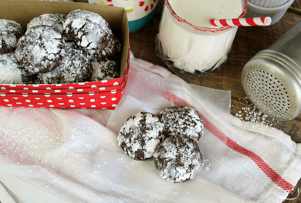 A trio of Christmas cookies with cold milk.