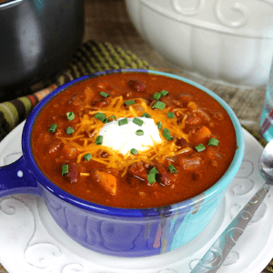 Autumn inspired chili topped with sour cream, shredded cheese and green onion.