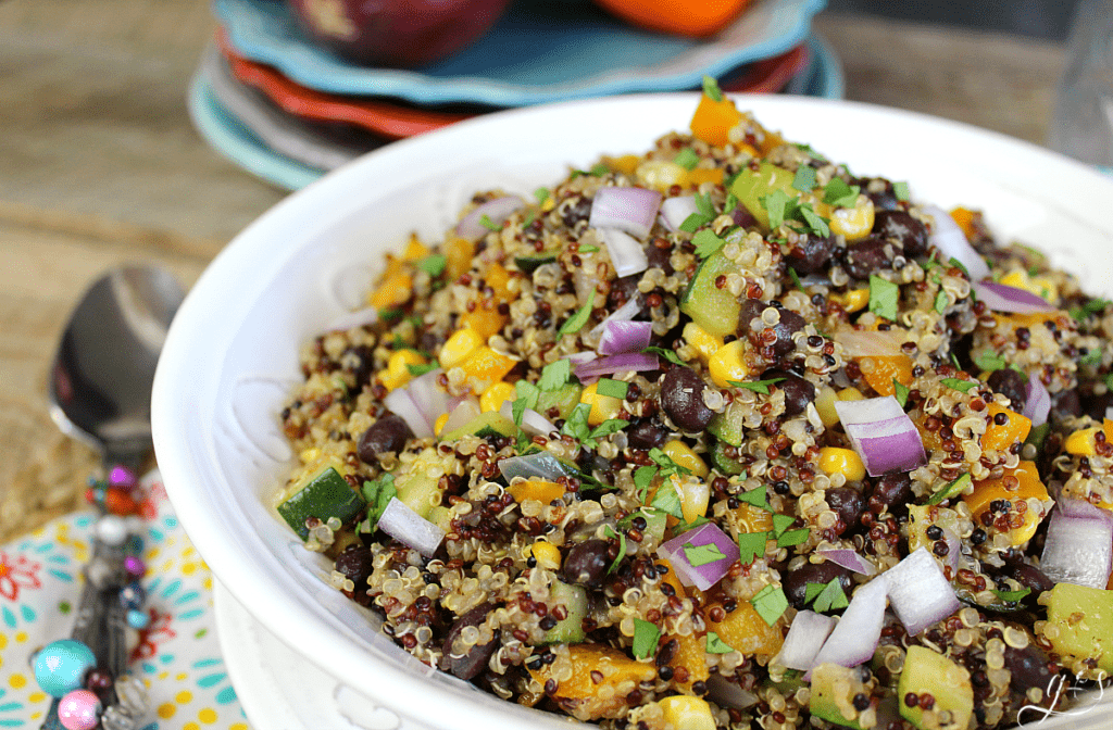 White bowl filled with gluten free southwestern quinoa salad.