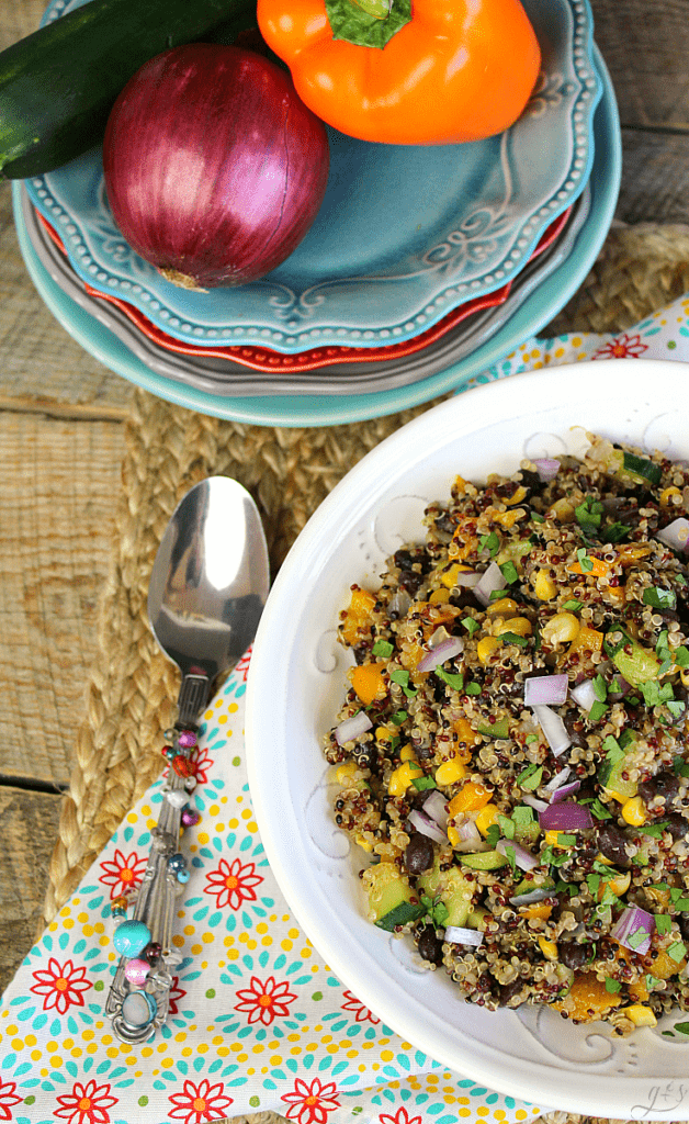 Dairy free vegetarian quinoa salad with fresh vegetables. 