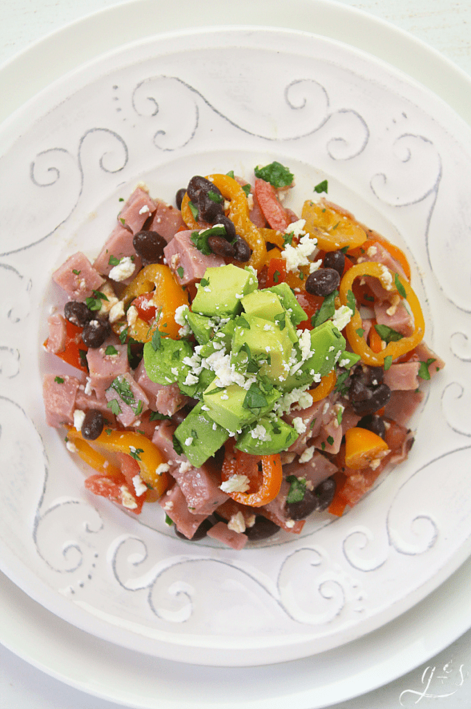 The BEST Ham Black Bean & Veggie Salad | Do you need to use up some leftover ham or have some fresh vegetables that will go bad? This clean eating and gluten-free salad is just the recipe for you! Healthy and easy recipes like this using whole foods are perfect for weightloss. There is only one dressing ingredient too: extra virgin olive oil! Summer parties need this summer salad too! #recipes #lunch #Easter 