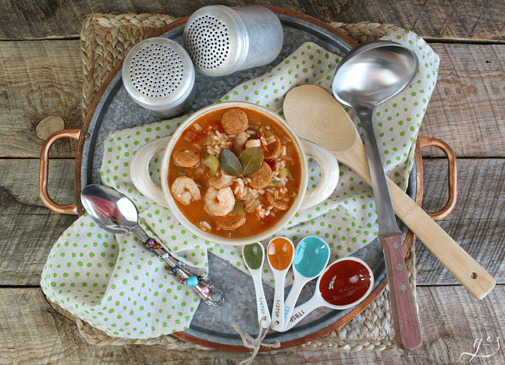 Overhead photo of a Cajun recipe staged on a metal tray.