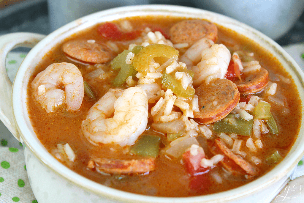 Bright bowl with shrimp, chicken andouille sausage, and healthful veggies.