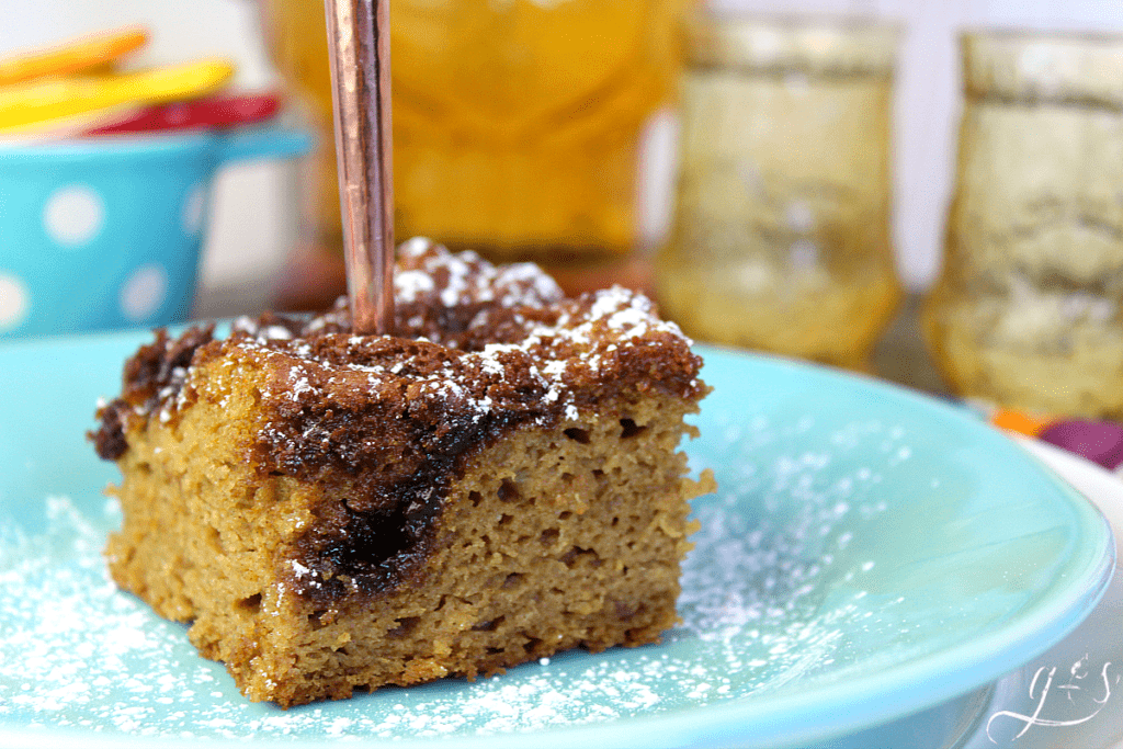 Up close shot of sweet bread with a pocket of cinnamon and sugar goodness. with in the piece of cake.