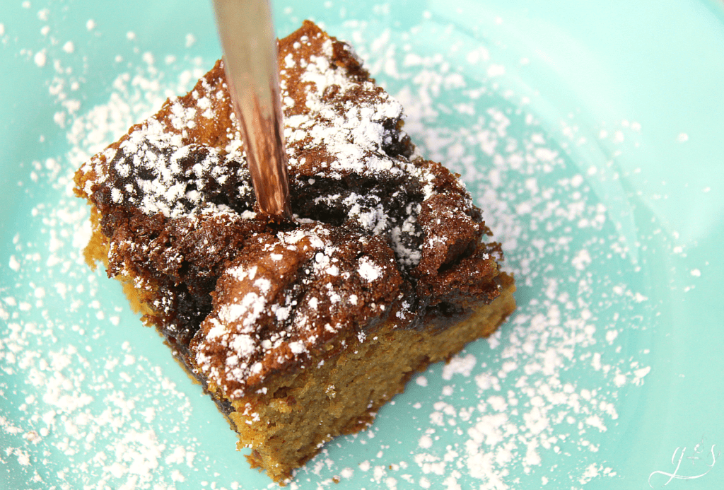 Up close and gorgeous photo of gluten free cowboy bread with powdered sugar. 