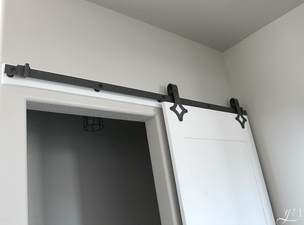 barn door hardware on white barn door