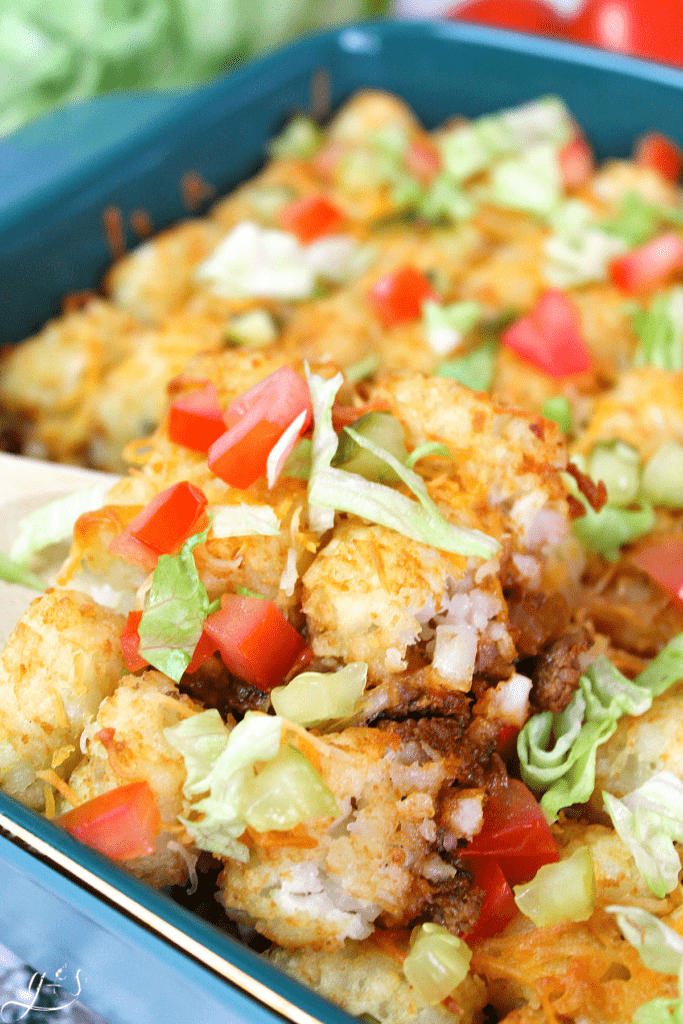 The BEST Skinny Cheeseburger Casserole | This clean eating homemade recipe makes the perfect family dinner. Healthy, gluten free, and tater tots-well hello delicious! You can make this in one pot like Hamburger Helper or use a 9x13 pan. All the flavors of a Cheese burger without the bun (low carb). Use any ground meat of choice, turkey, beef, venison, or buffalo. Add a little bacon fat for flavor and serve with pickles, lettuce, and tomatoes. #recipes #families #food
