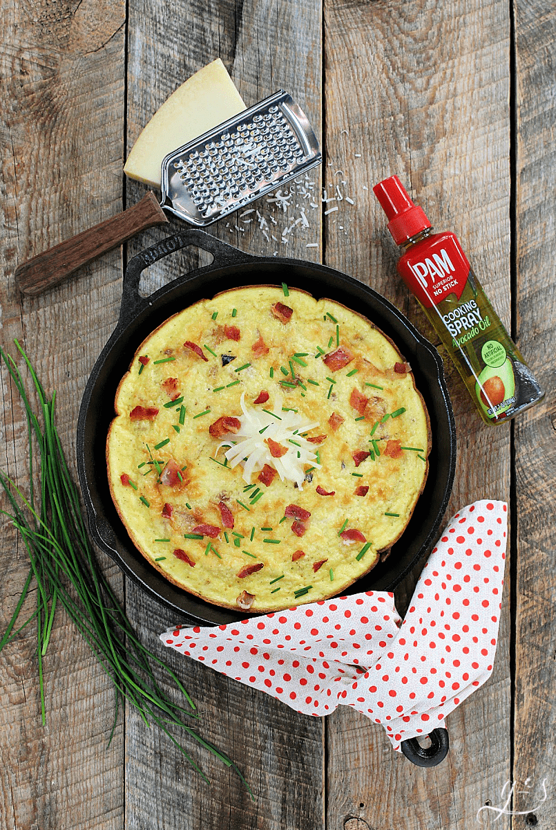 Overhead photo of 5 Ingredient Bacon and Parmesan Frittata in cast iron pan. 