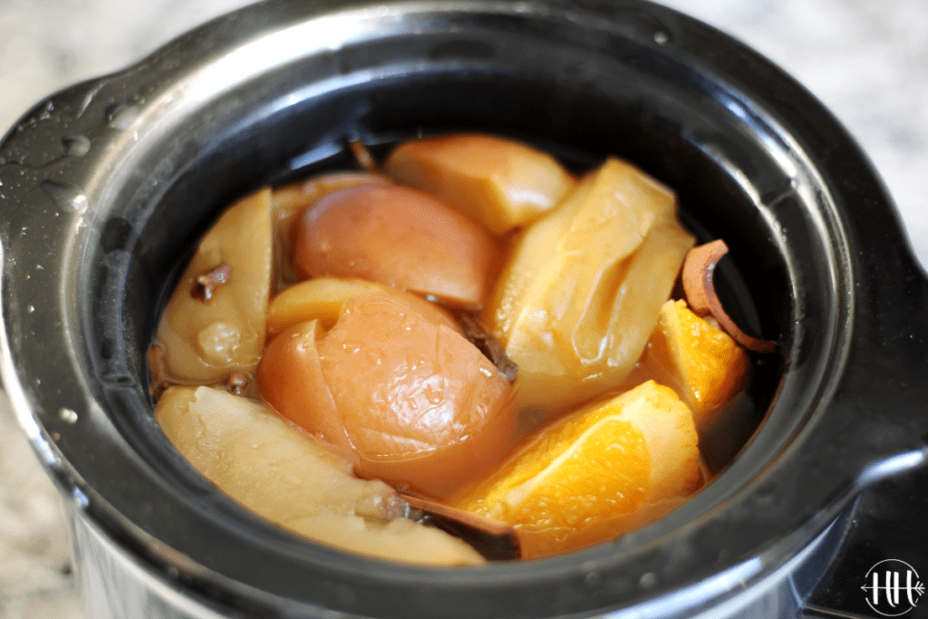 Apples and oranges cooked down in a crockpot. 