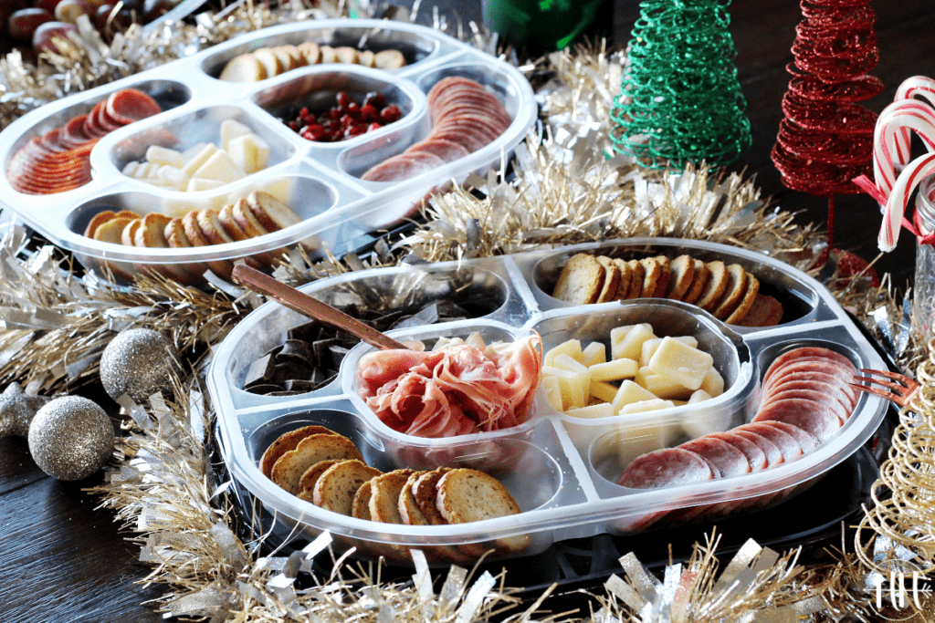 Hillshire Snacking Social Platters on a table decorated for the holidays.