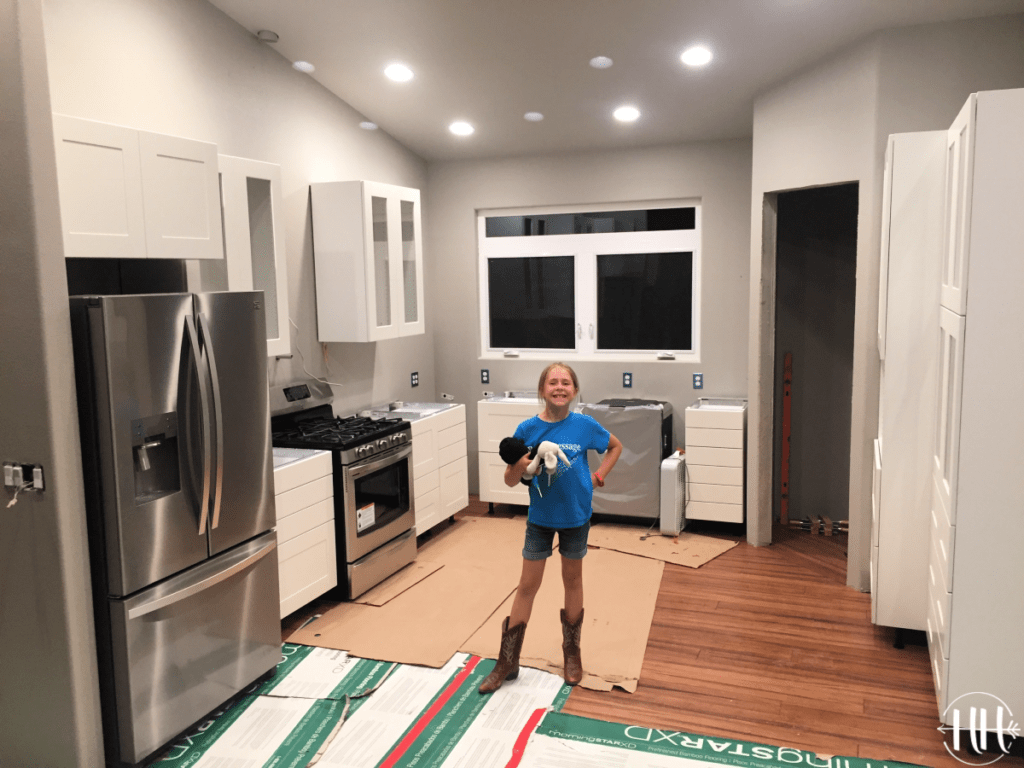 Proud daughter in her family's new IKEA kitchen.