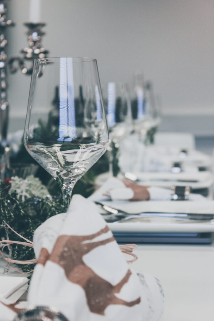 Clear glass stemware on a holiday table.
