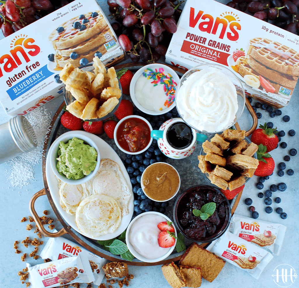 #ad Serve this Waffle Dippers Board at your next kids party, breakfast, or brunch. Van's frozen waffles are nutritious (gluten free, whole grain-protein packed!, and organic options) and easy to make into "soldiers" in this recipe idea. Use a pizza cutter to cut waffles and place on a cookie sheet, tray, or cutting board with sweet and savory dipping options like Greek yogurt, healthy nut butter, maple syrup, fruit compote, homemade whipped cream, ALL the toppings! #VansFoodsWaffles #vansfoods