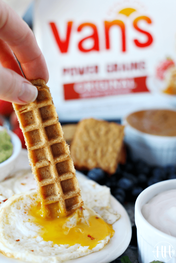 #ad Serve this Waffle Dippers Board at your next kids party, breakfast, or brunch. Van's frozen waffles are nutritious (gluten free, whole grain-protein packed!, and organic options) and easy to make into "soldiers" in this recipe idea. Use a pizza cutter to cut waffles and place on a cookie sheet, tray, or cutting board with sweet and savory dipping options like Greek yogurt, healthy nut butter, maple syrup, fruit compote, homemade whipped cream, ALL the toppings! #VansFoodsWaffles #vansfoods