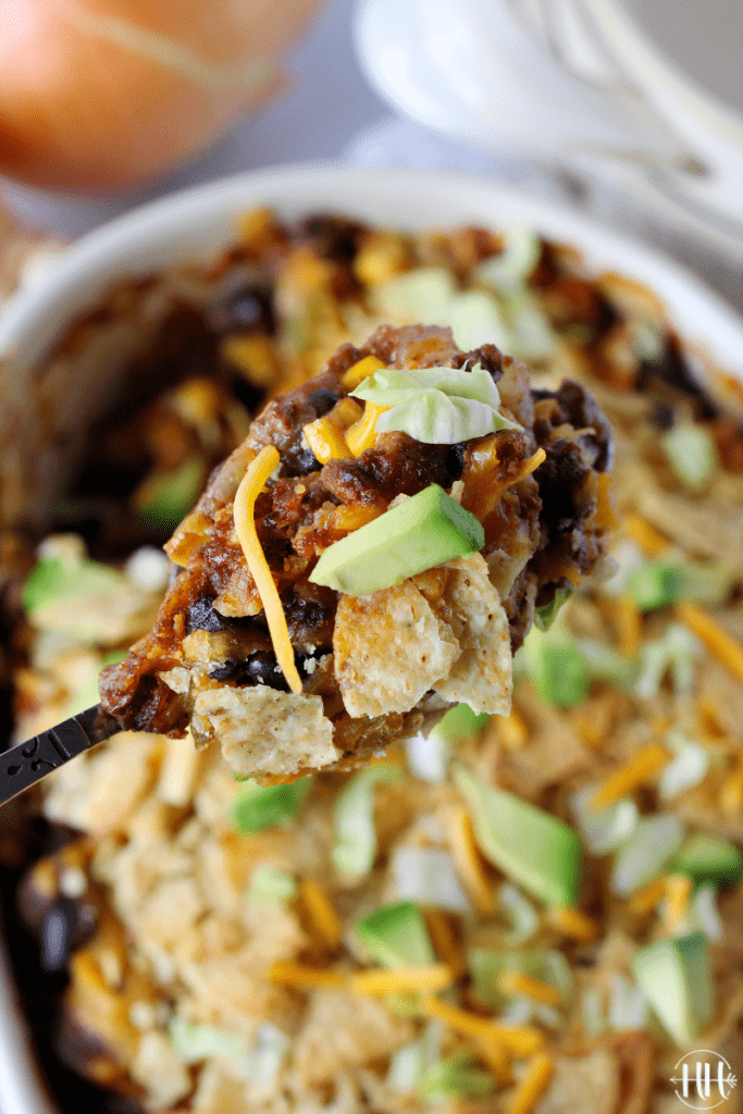 Delicious spoonful of beef enchilada casserole. 