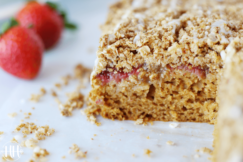 A close up shot of baked strawberries in a gluten free cake. 
