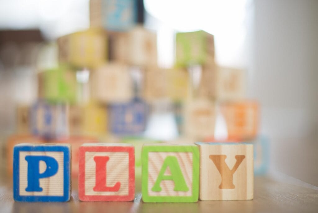 Blocks that spell, PLAY, for a play cafe article. 