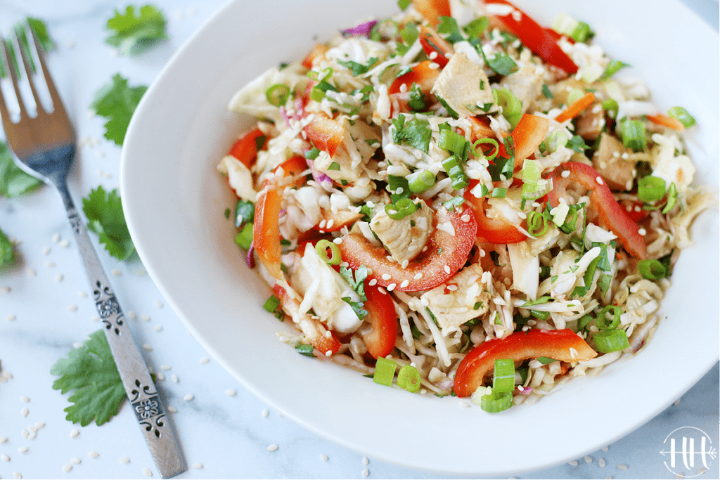 Gluten free and dairy free coleslaw salad in a white bowl.