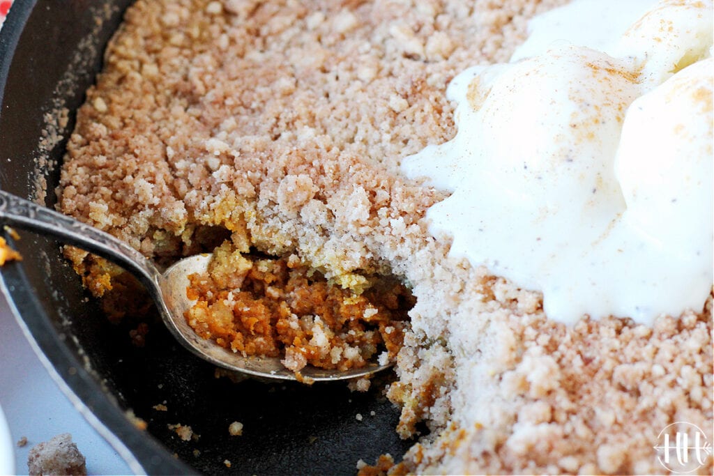 Easy pumpkin crumble with a creamy custard bottom and crispy cinnamon streusel topping!