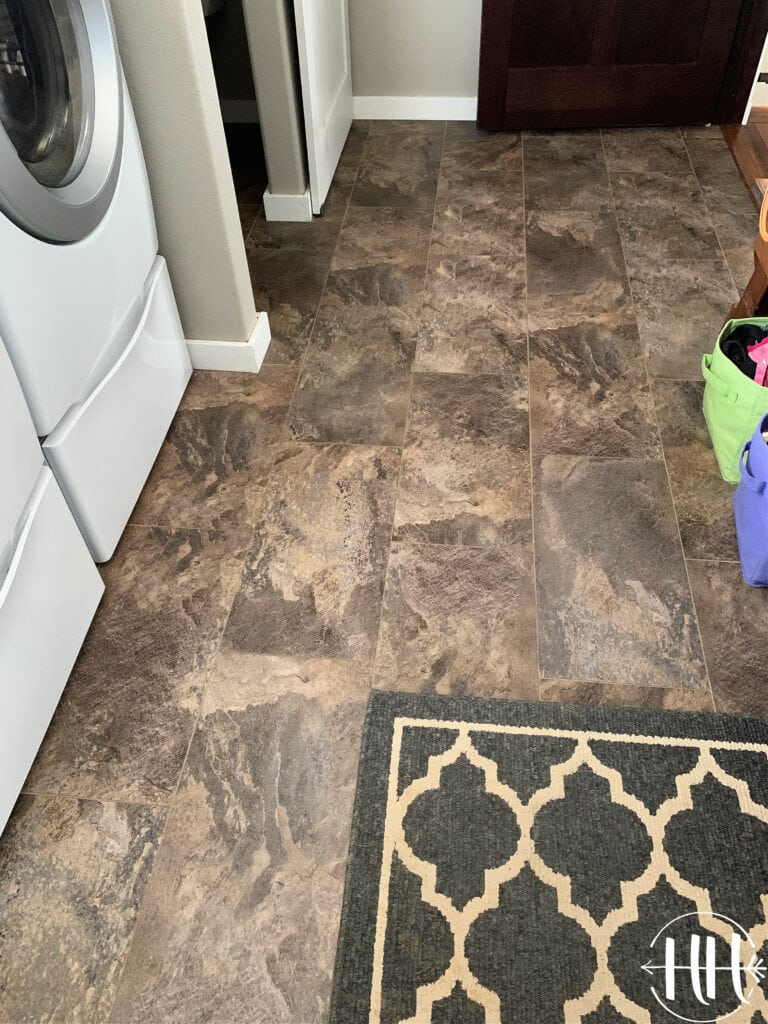 Luxury Vinyl Plank Tile Flooring finished and sparkling a laundry room. 