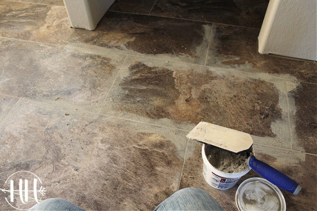 LVT flooring with grout before it is cleaned. 