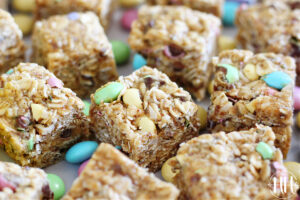 Up close photo of no bake Easter M&M Cookie Bars with pastel M&Ms.