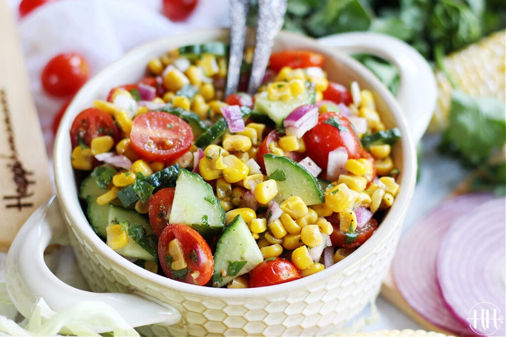 Roasted Corn and Cucumber Salsa in a pretty bowl to be used in tacos, burritos, and tostadas.