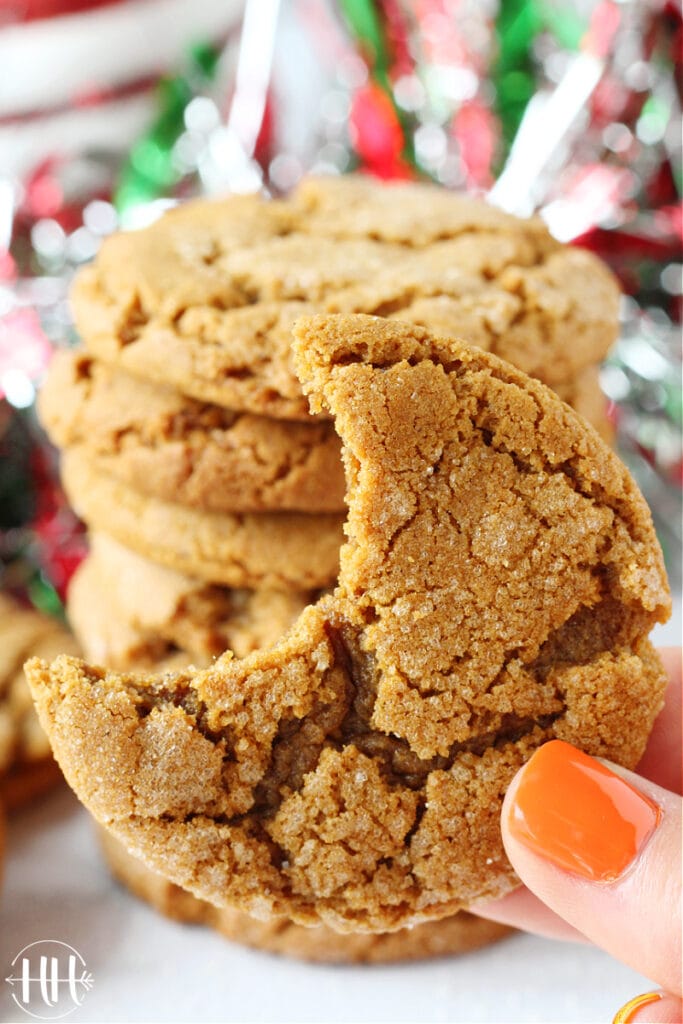 A bite taken out of a Molasses Crinkles Cookie. 