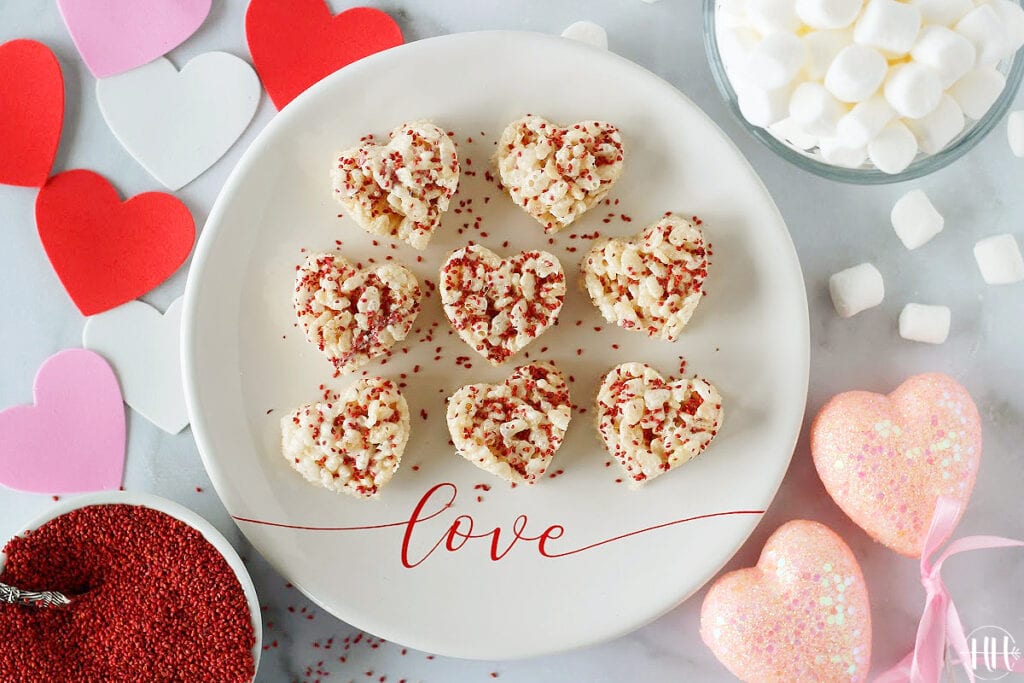 Cranberry Seed Rice Krispie treats shaped into hearts for Valentine's Day